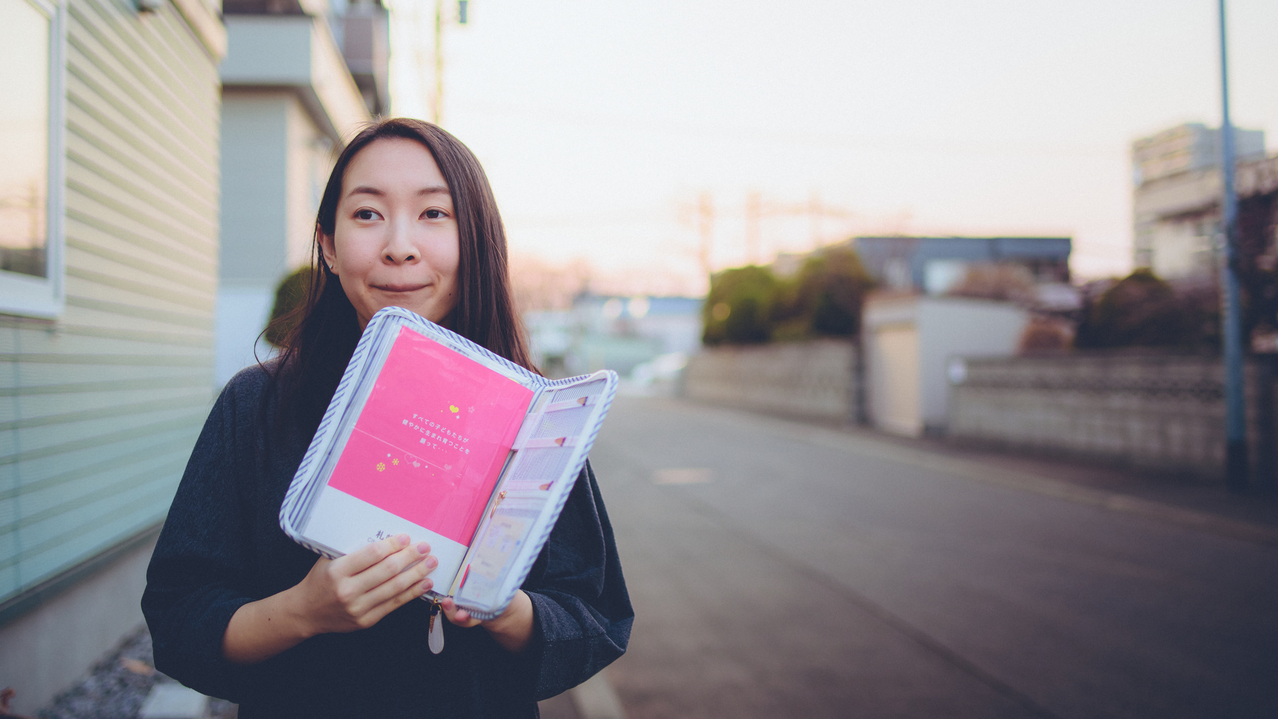 Smiling Japanese Woman with Sunset